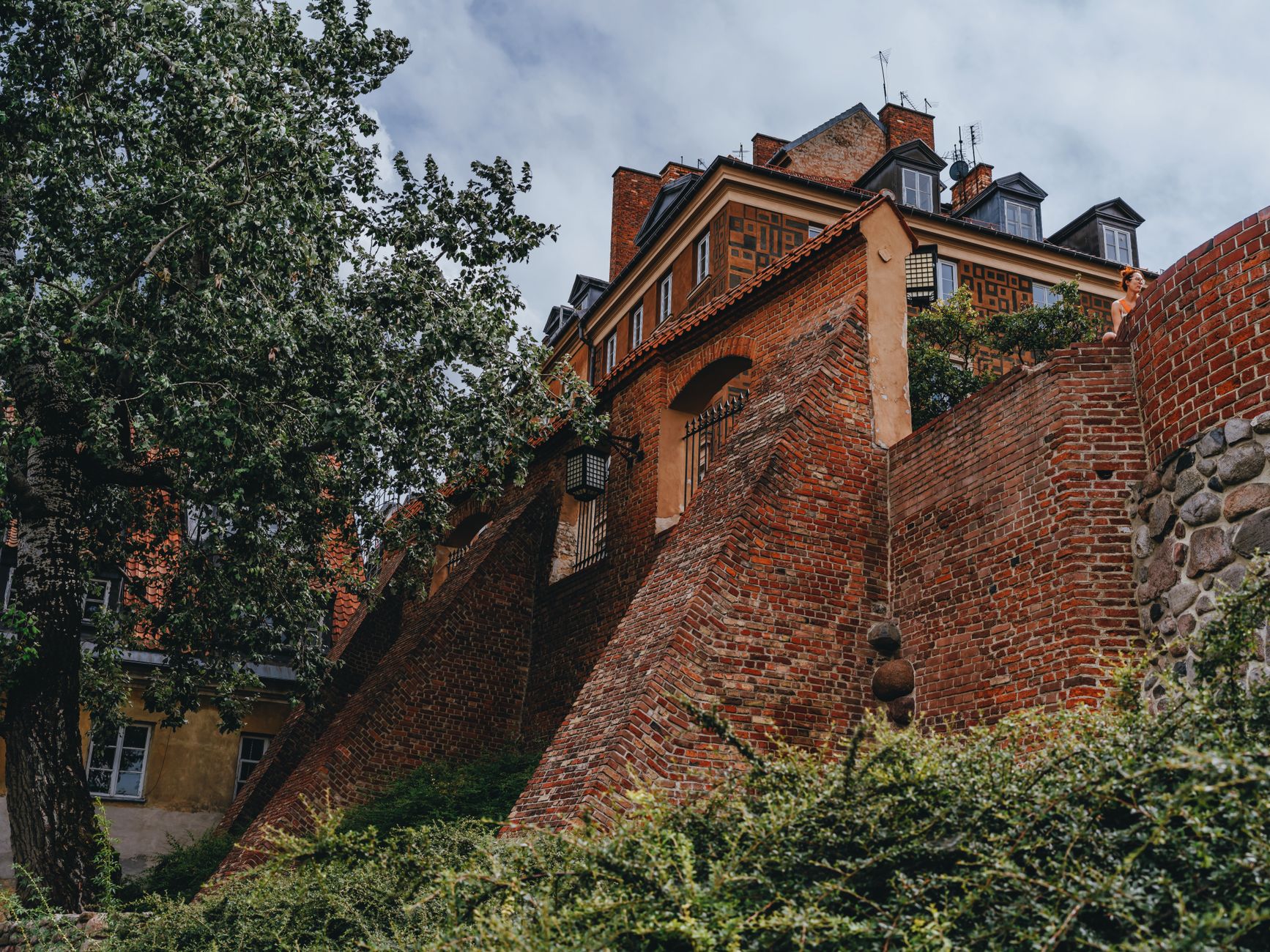 A captivating view of classic brick architecture in Warsaw, showcasing local landmarks and urban charm. — Trójmiasto