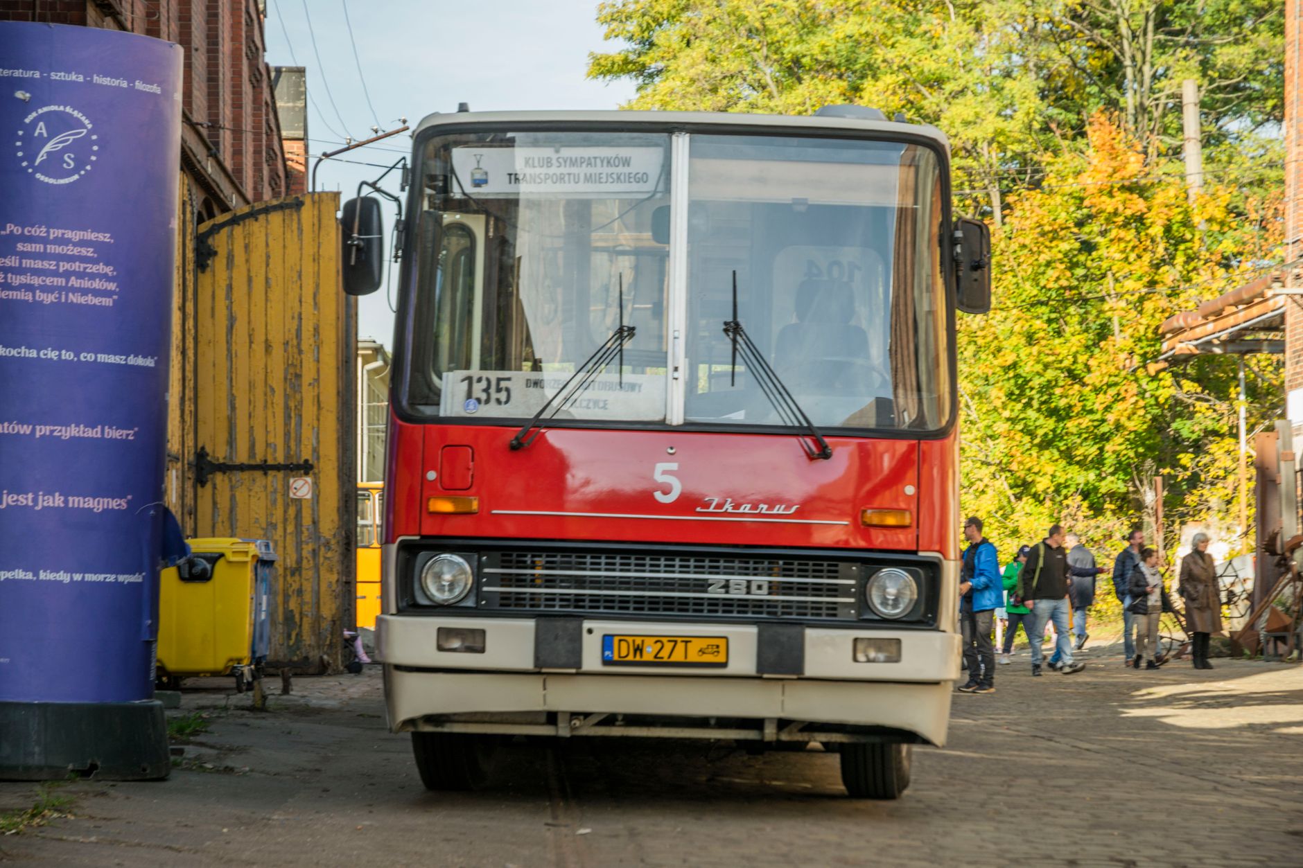 Classic red Ikarus bus in Wrocław, Poland showcasing urban transit and vintage charm. — Trójmiasto