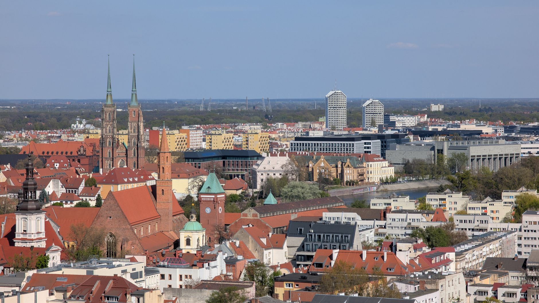 A stunning aerial view of Wrocław showcasing its historic architecture alongside modern buildings. — Trójmiasto