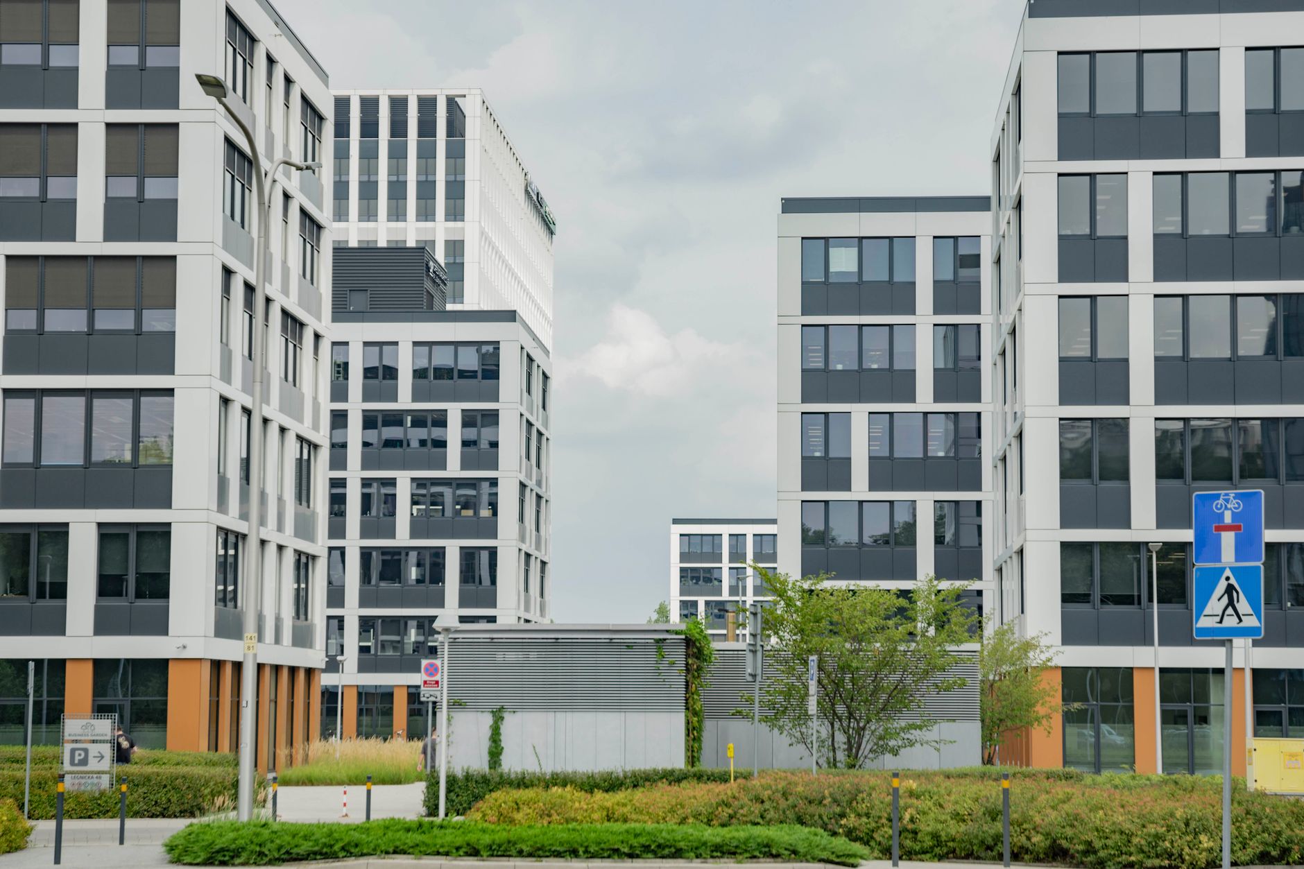 Contemporary office buildings in Wrocław, showcasing modern architecture and urban design. — Trójmiasto