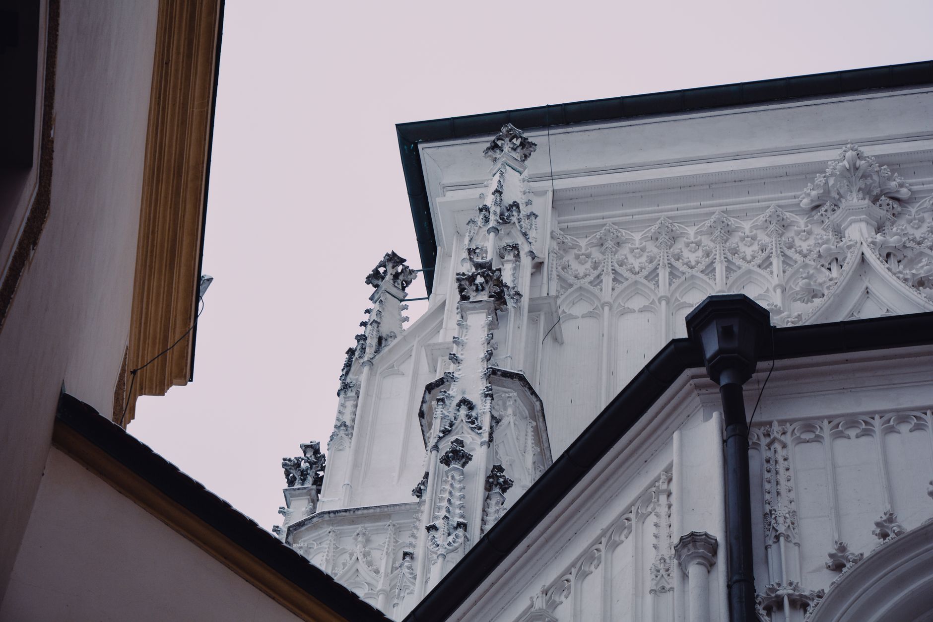 Ornate Gothic architecture showcasing intricate stone carvings in Passau, Germany. — Trójmiasto