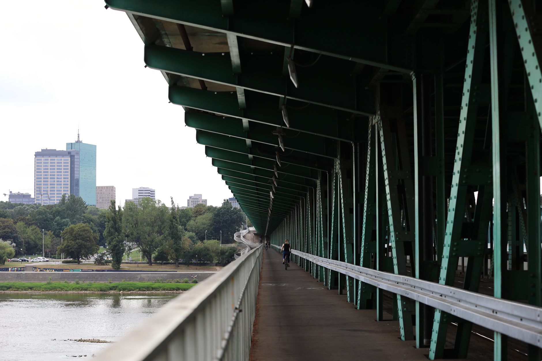 Cityscape view from under a bridge in Warsaw, emphasizing architectural perspectives. — Trójmiasto
