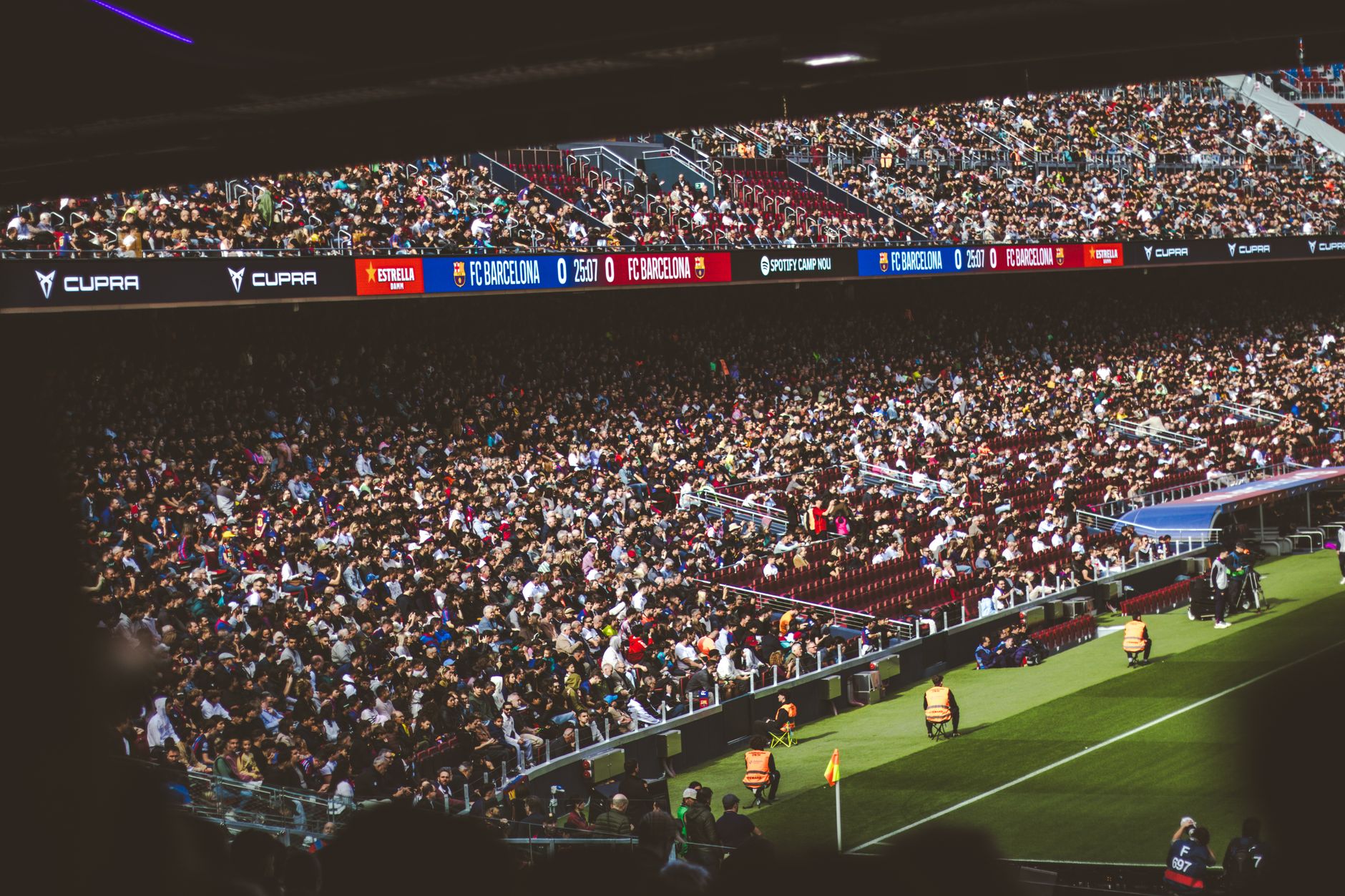 Packed stadium with spectators at an FC Barcelona soccer match, vibrant atmosphere. — Trójmiasto