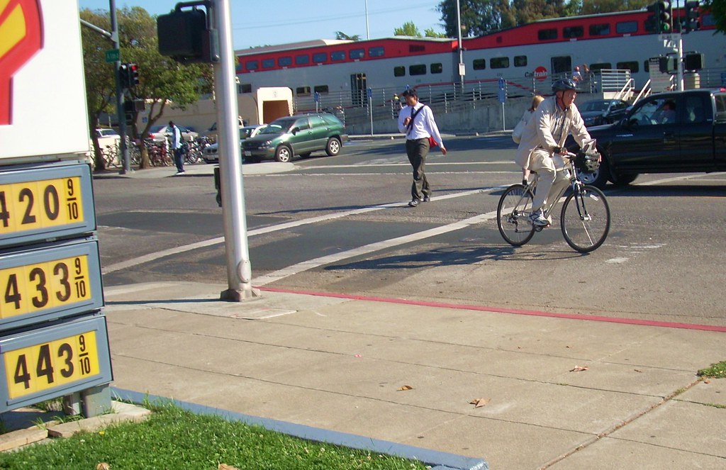 Bicycling past the gas station
